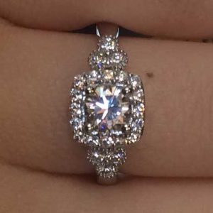 Round diamond with Square Halo