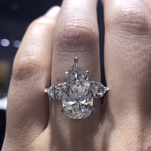 pear cut triple diamond engagement ring