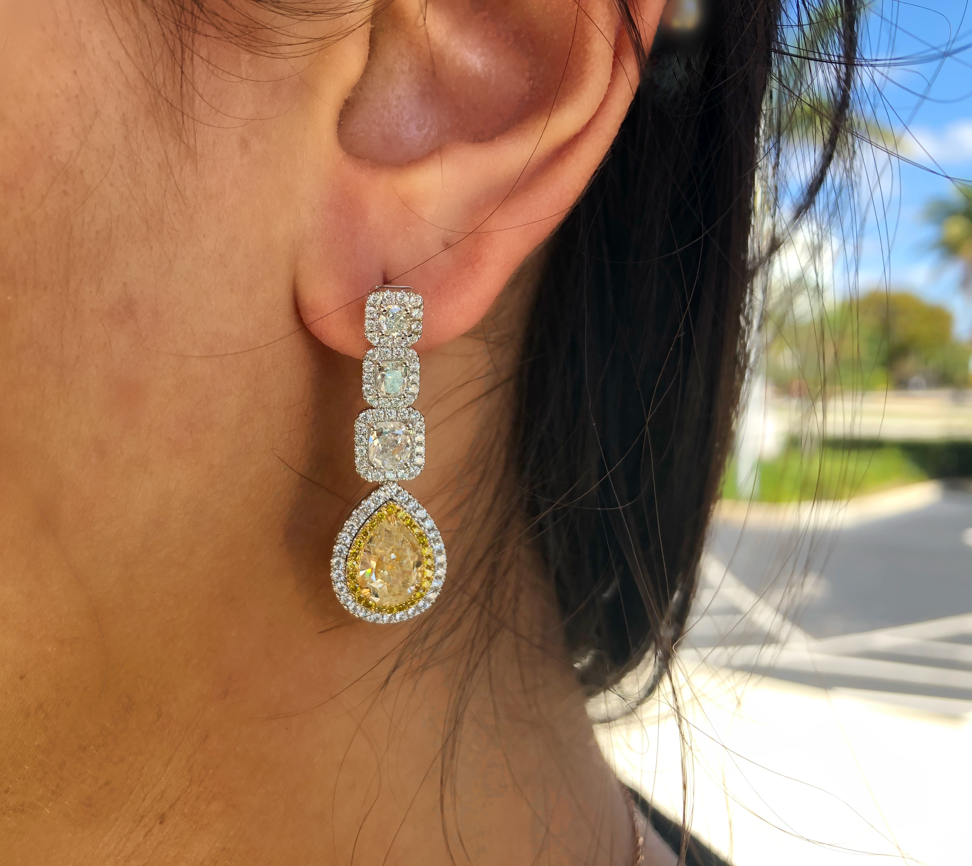 pear cut fancy yellow diamond dangle earrings