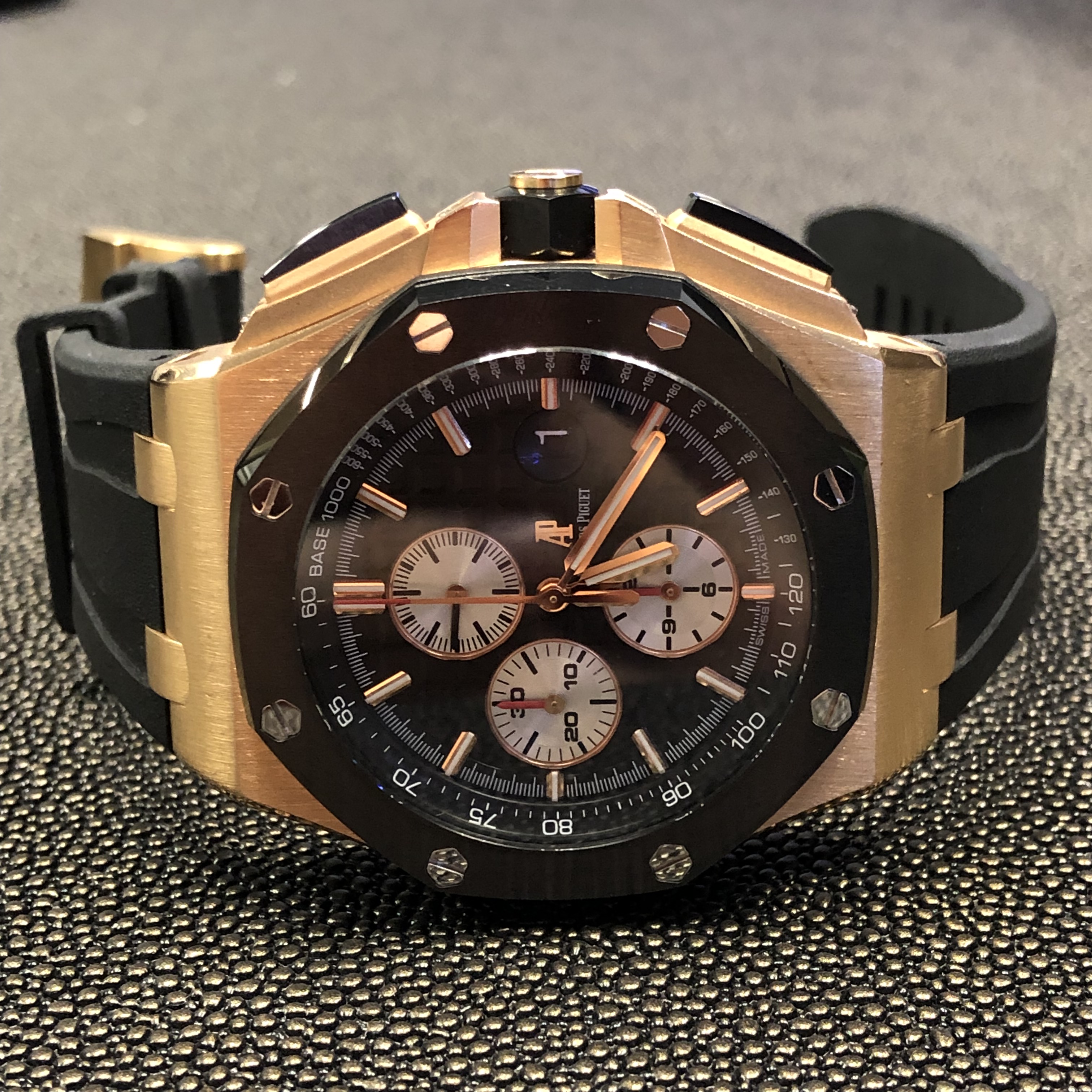 audemars piguet royal oak offshore rose gold rubber clad watch on its side