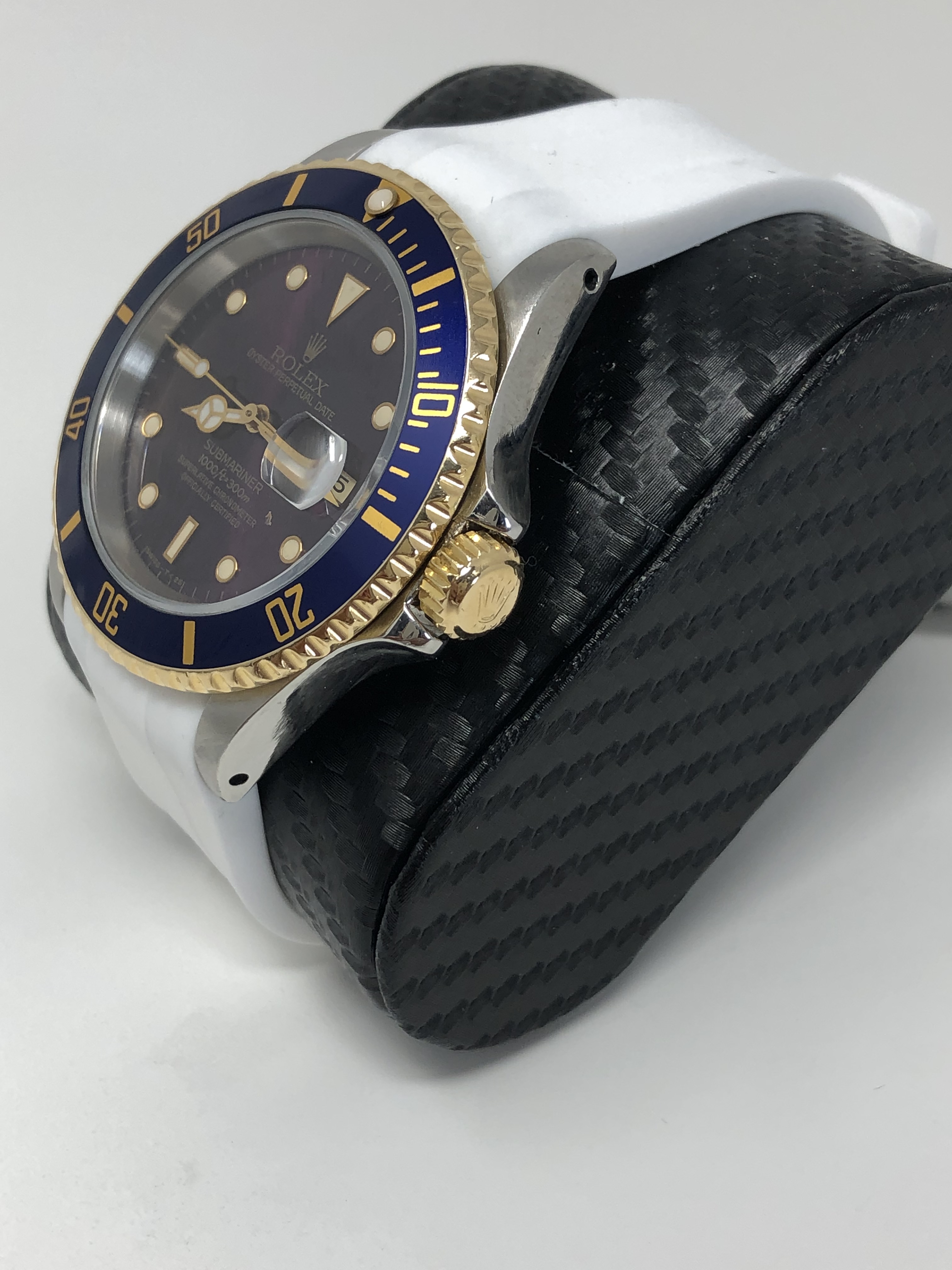 Rolex Submariner 16610 two tone blue dial with white strap