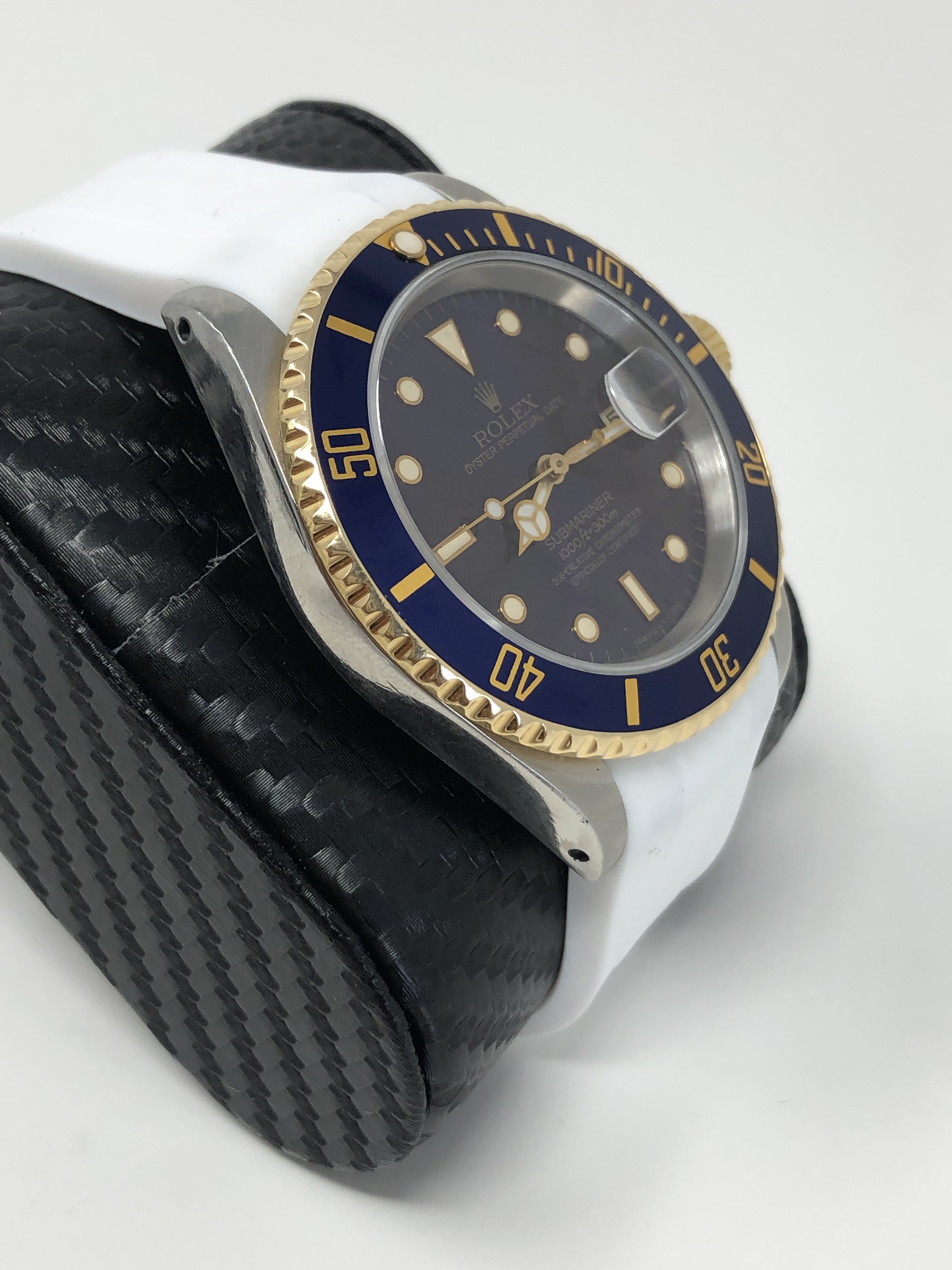 Rolex Submariner 16610 two tone blue dial with white strap