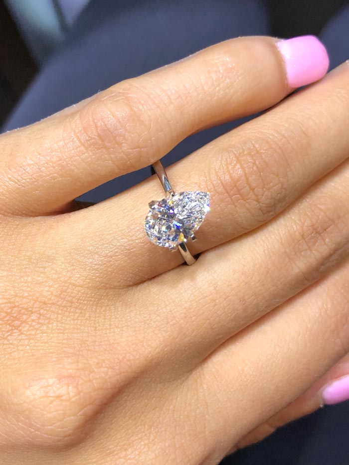Which way should a pear shaped diamond ring be worn?