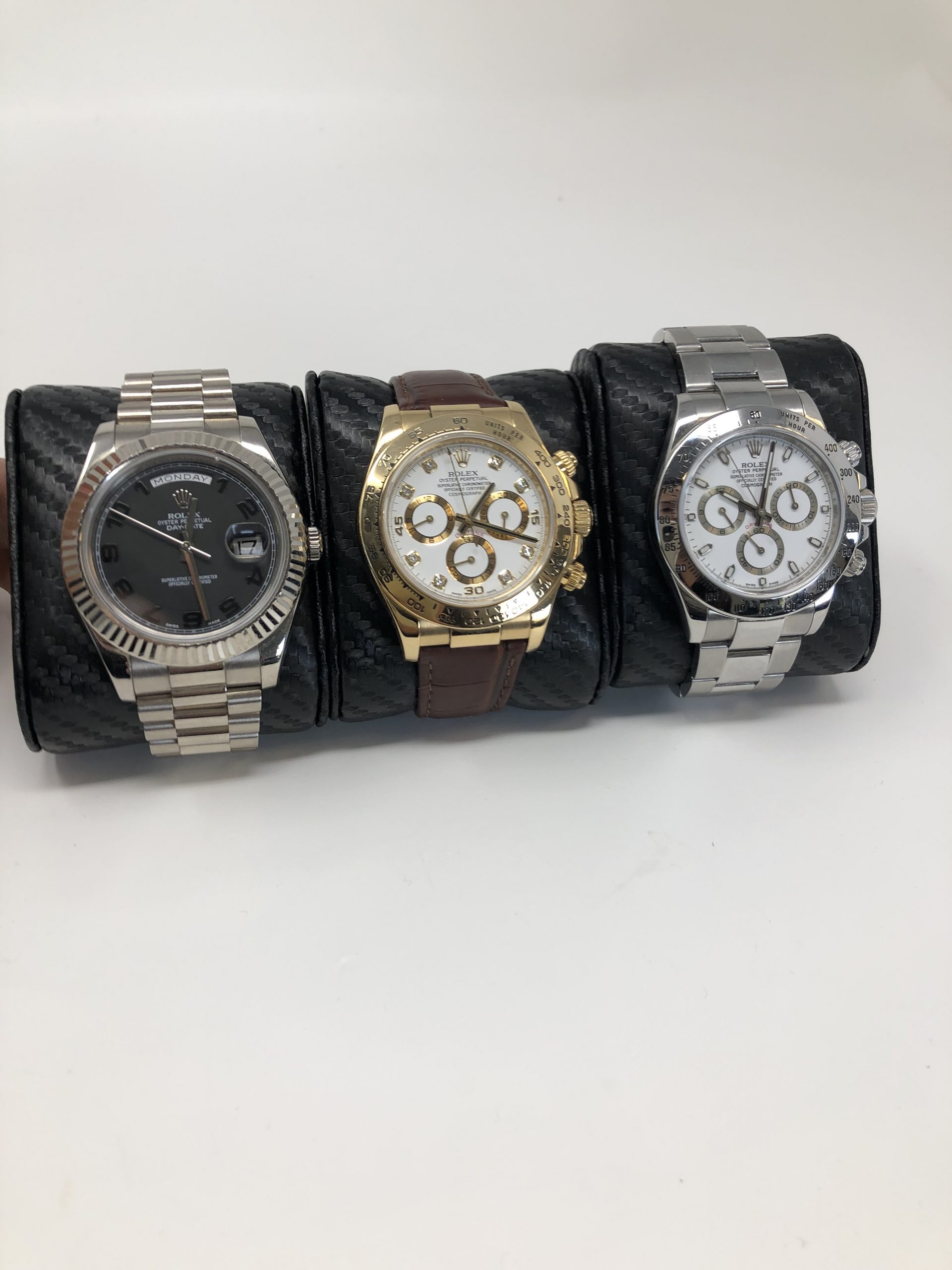 rolex oyster steel watches next to each other