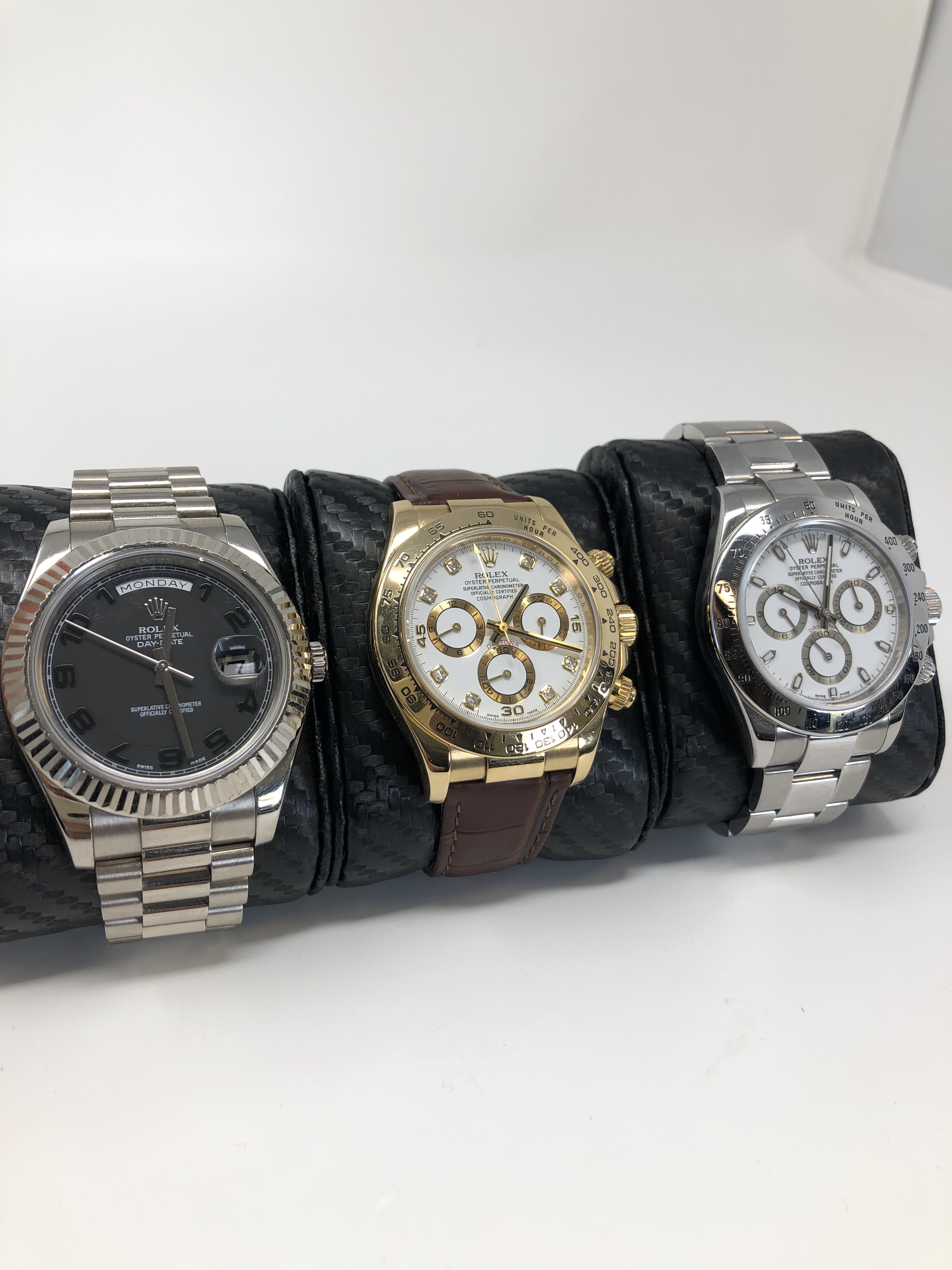 rolex oyster steel watches next to each other