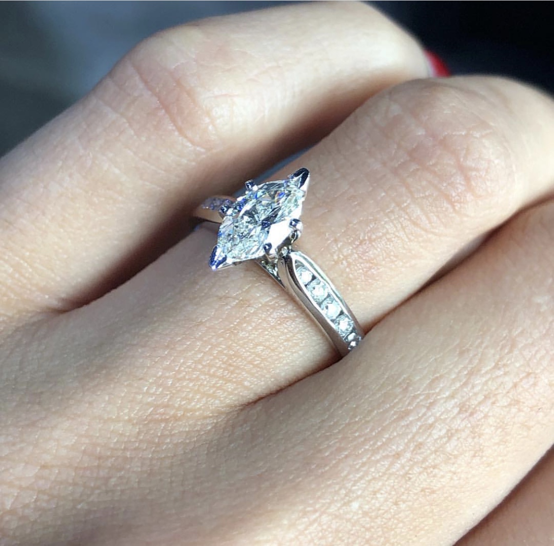 Marquise diamond engagement ring on diamond band