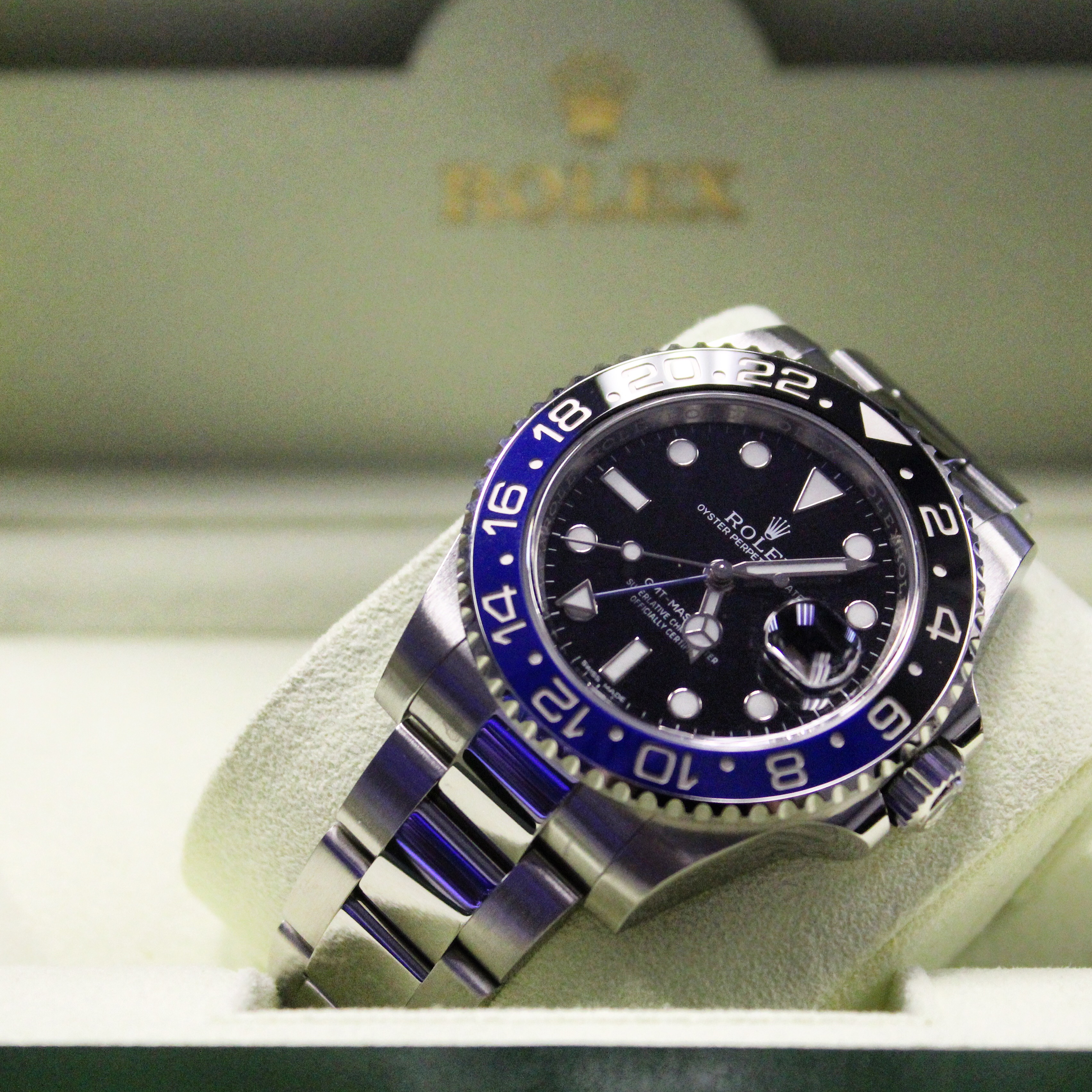 luxury watch vs smartwatch rolex batman GMT II