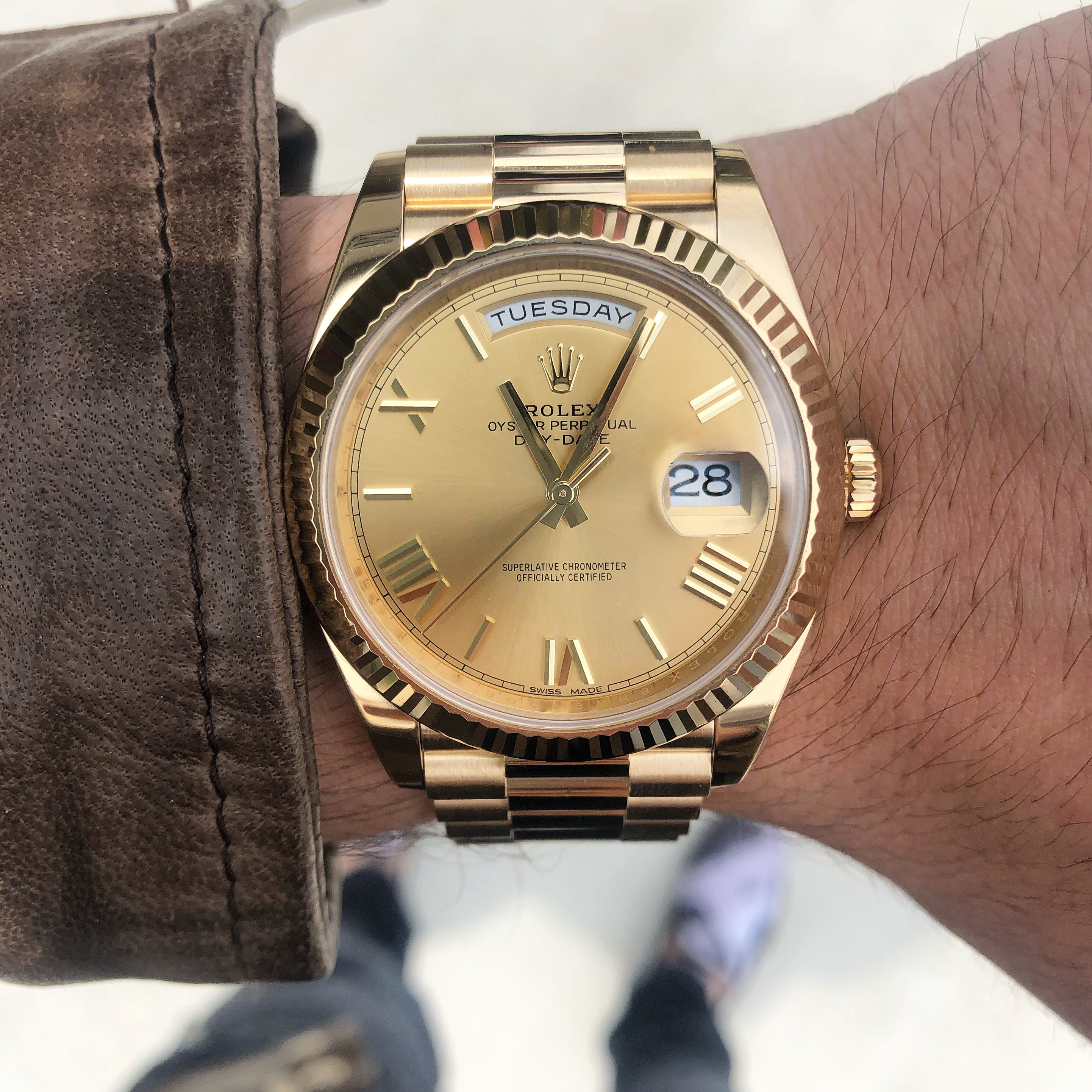 luxury watch vs smartwatch presidential rolex yellow gold