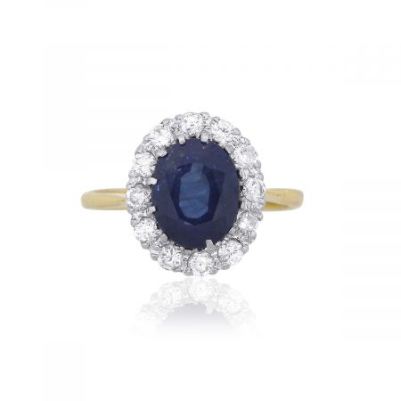 14k Yellow Gold 1.70ct Oval Cut Sapphire and 0.39ct Diamond Halo Ring