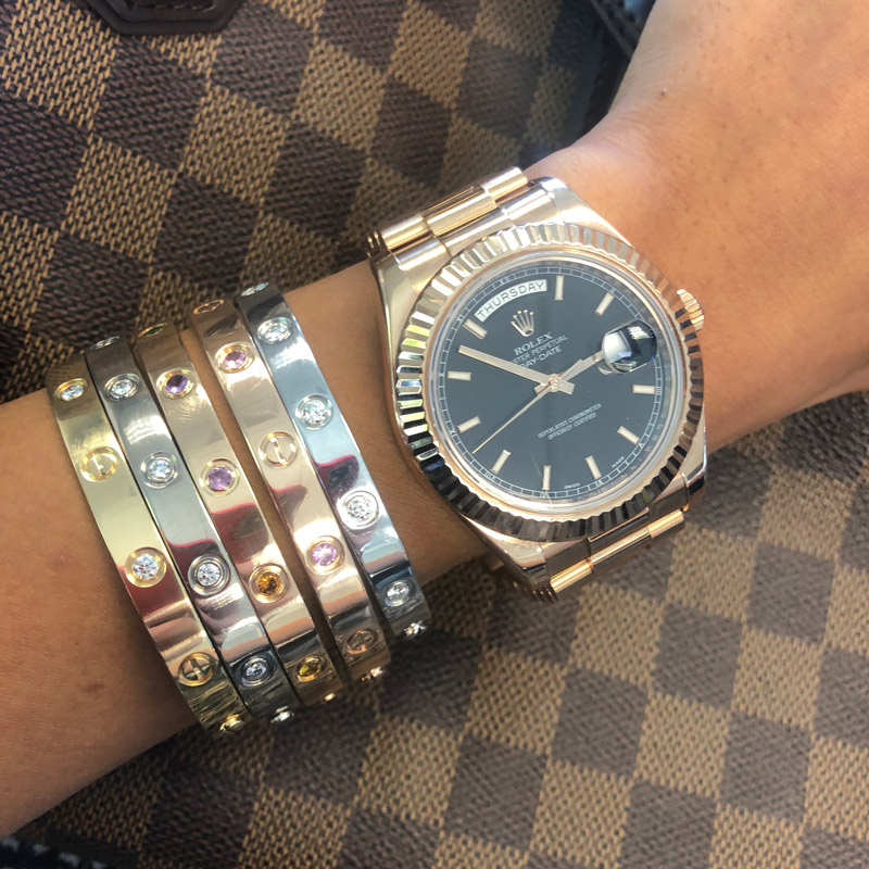 cartier love bracelet worn with watch