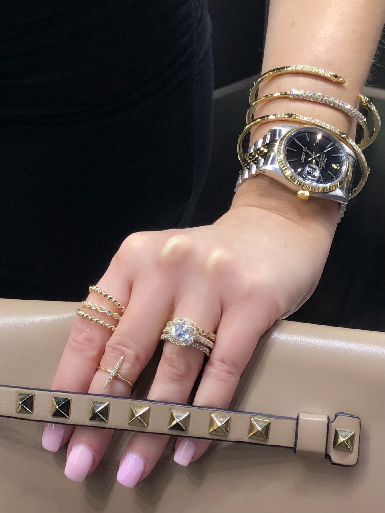luxury jewellery rolex and valentino bag 