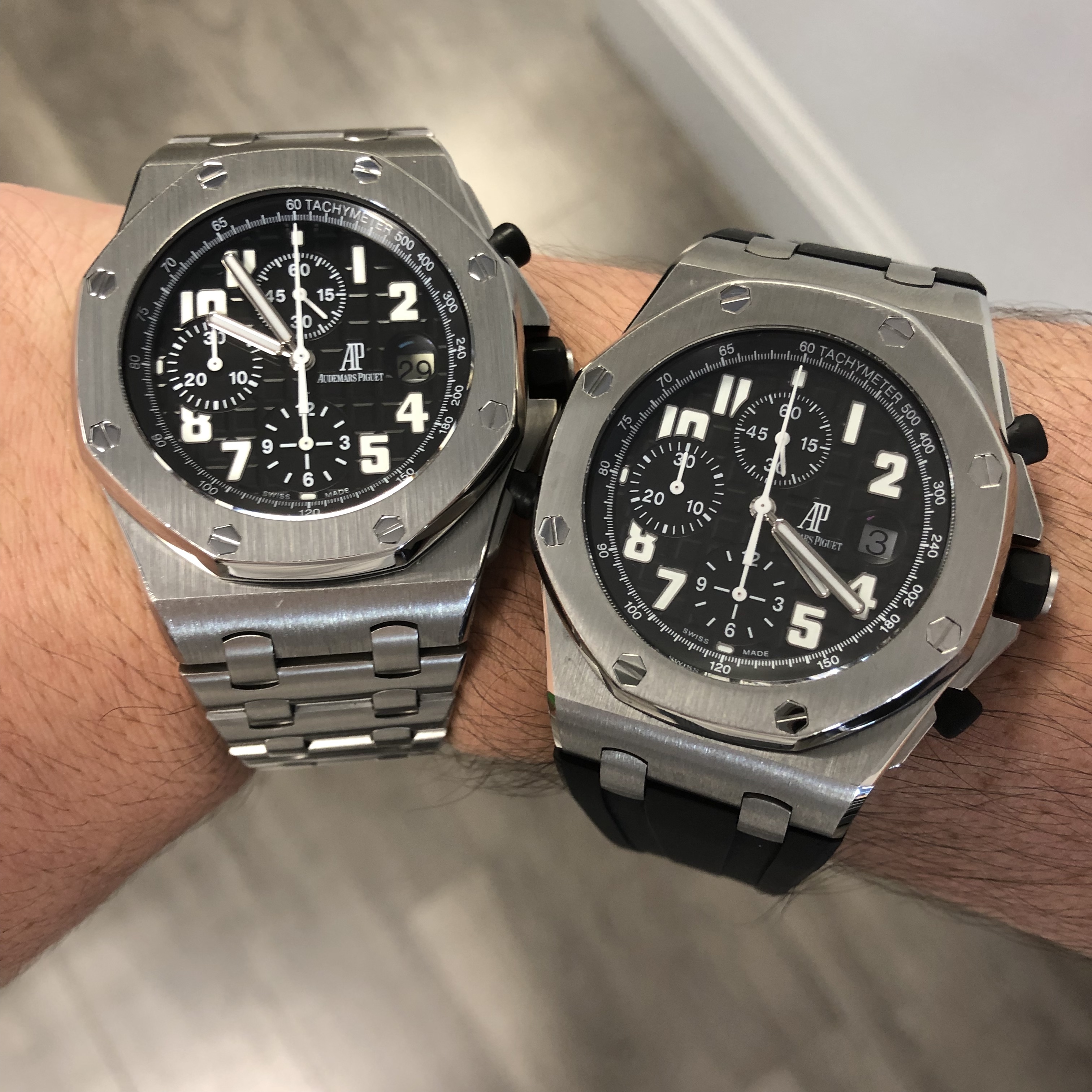 two audemars piguet black themes watches on wrist stainless steel