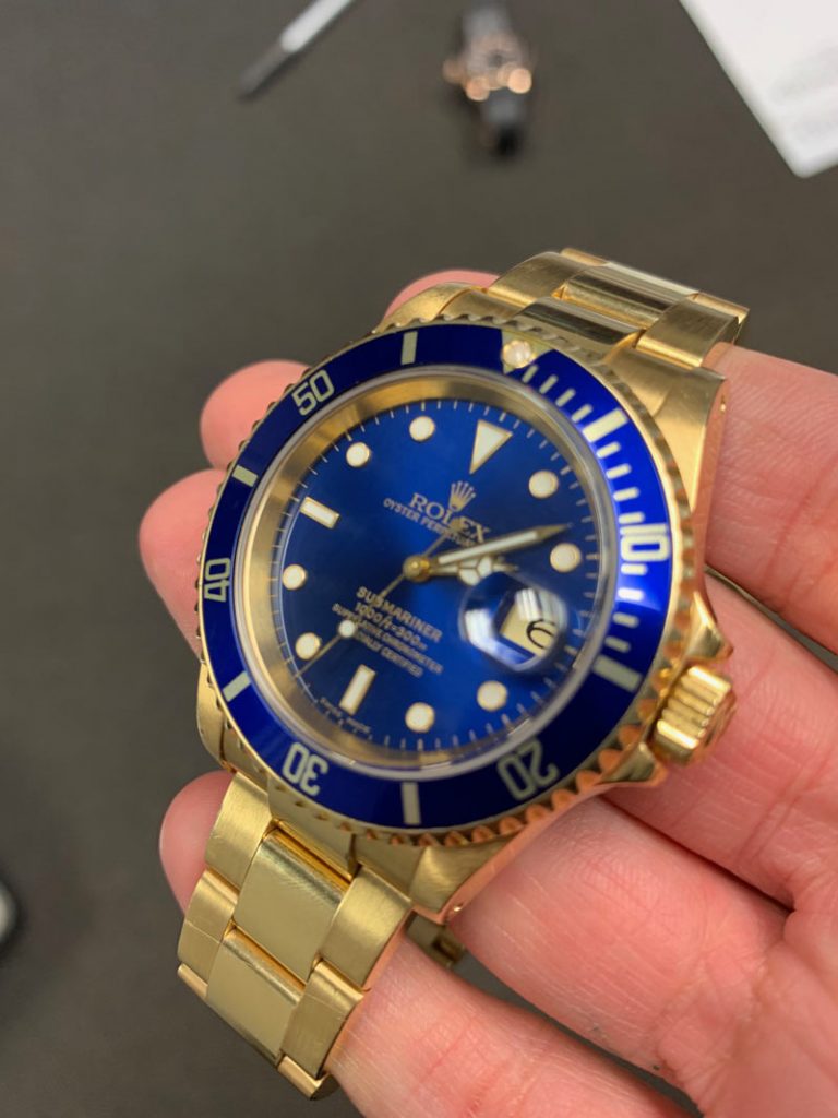 Rolex 16618 Submariner 18k Yellow Gold And Blue Watch Review Raymond Lee Jewelers