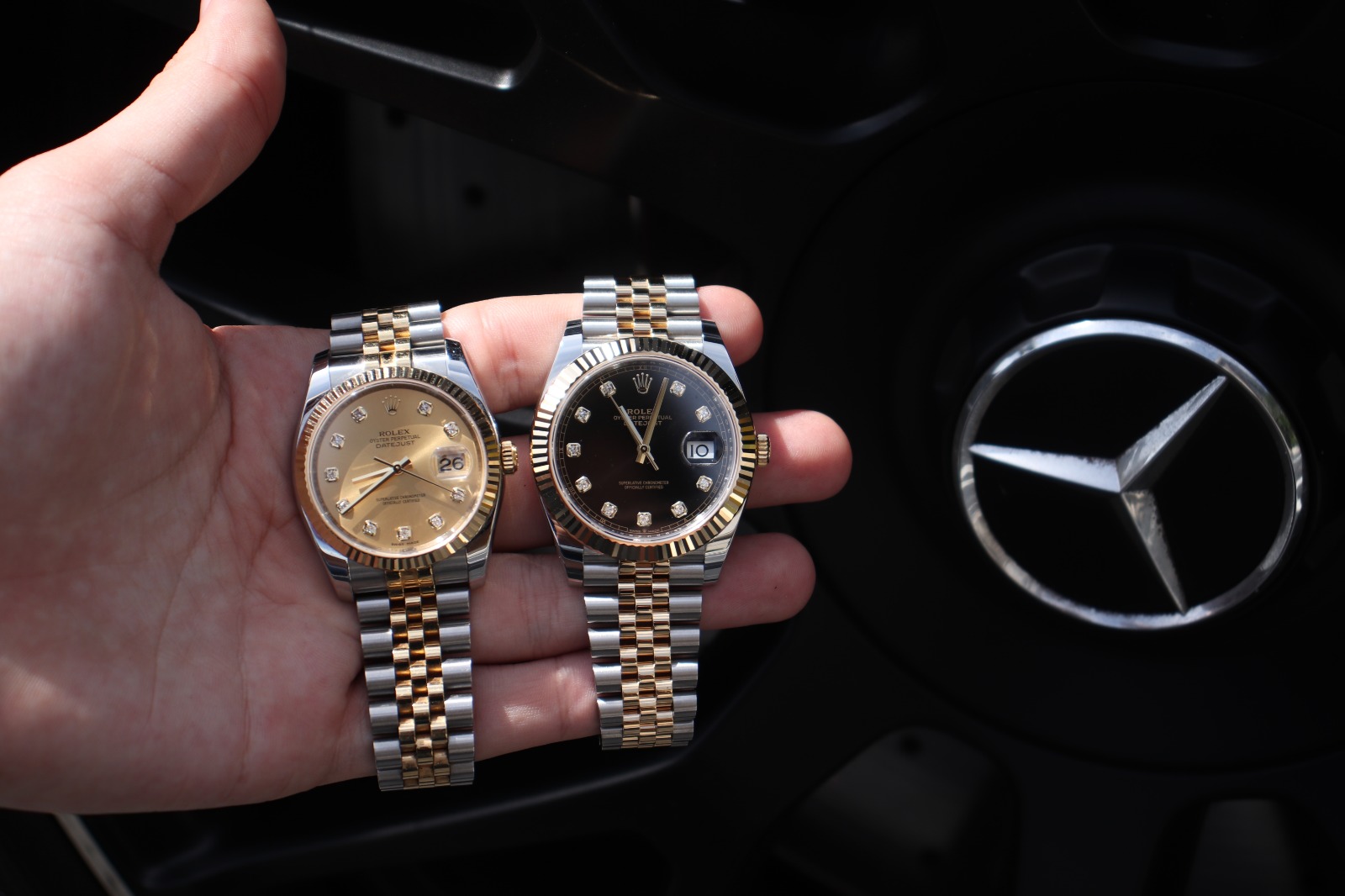 holding a rolex date just 116233 41mm vs 36mm black dial and gold dial