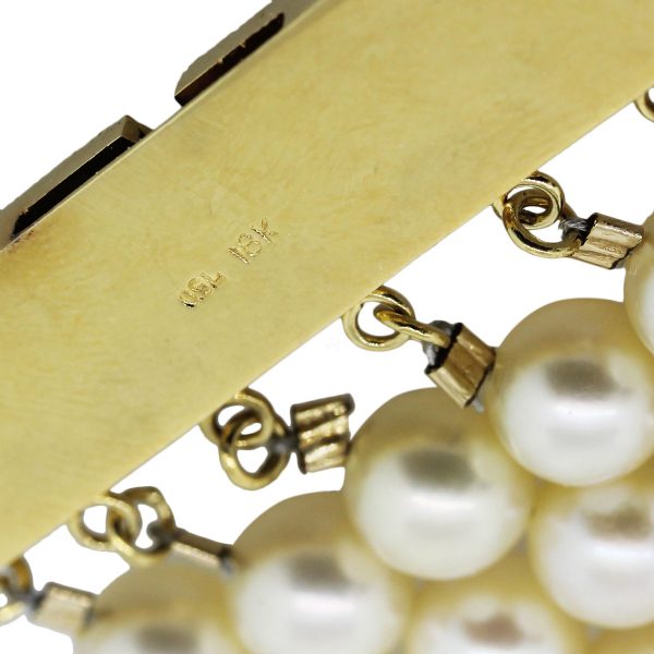 yellow gold and pearl bracelet