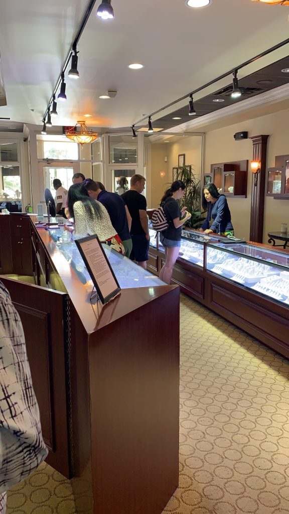 shoppers in jewelry showroom