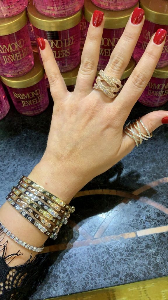 designer jewelry showroom featuring cartier love bracelets