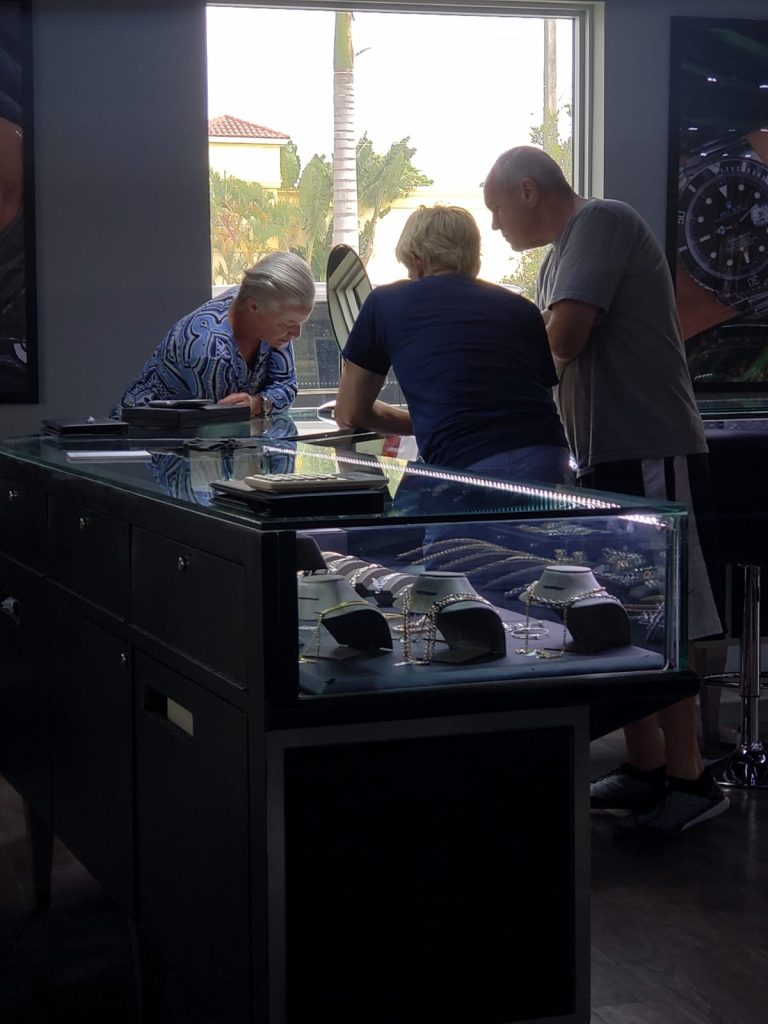people shopping for jewelry with diamonds