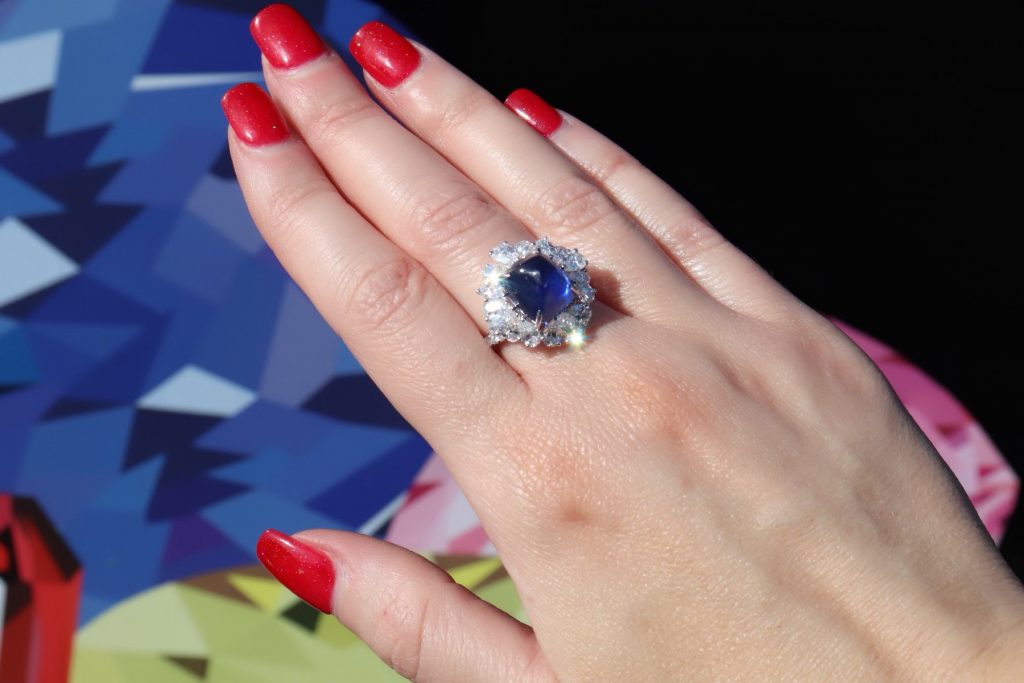 flower shaped diamond and sapphire ring