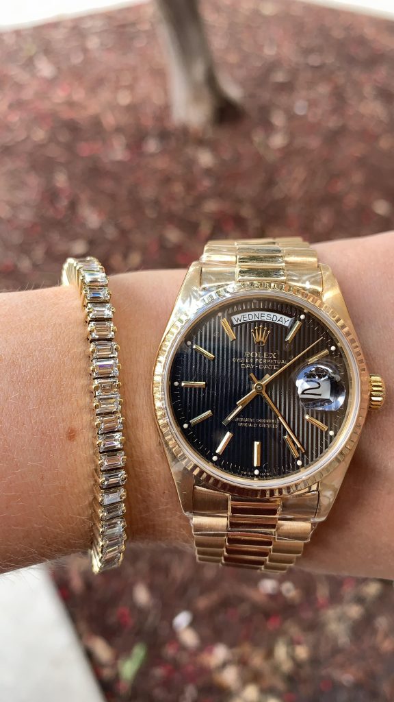 gold rolex and tennis bracelet