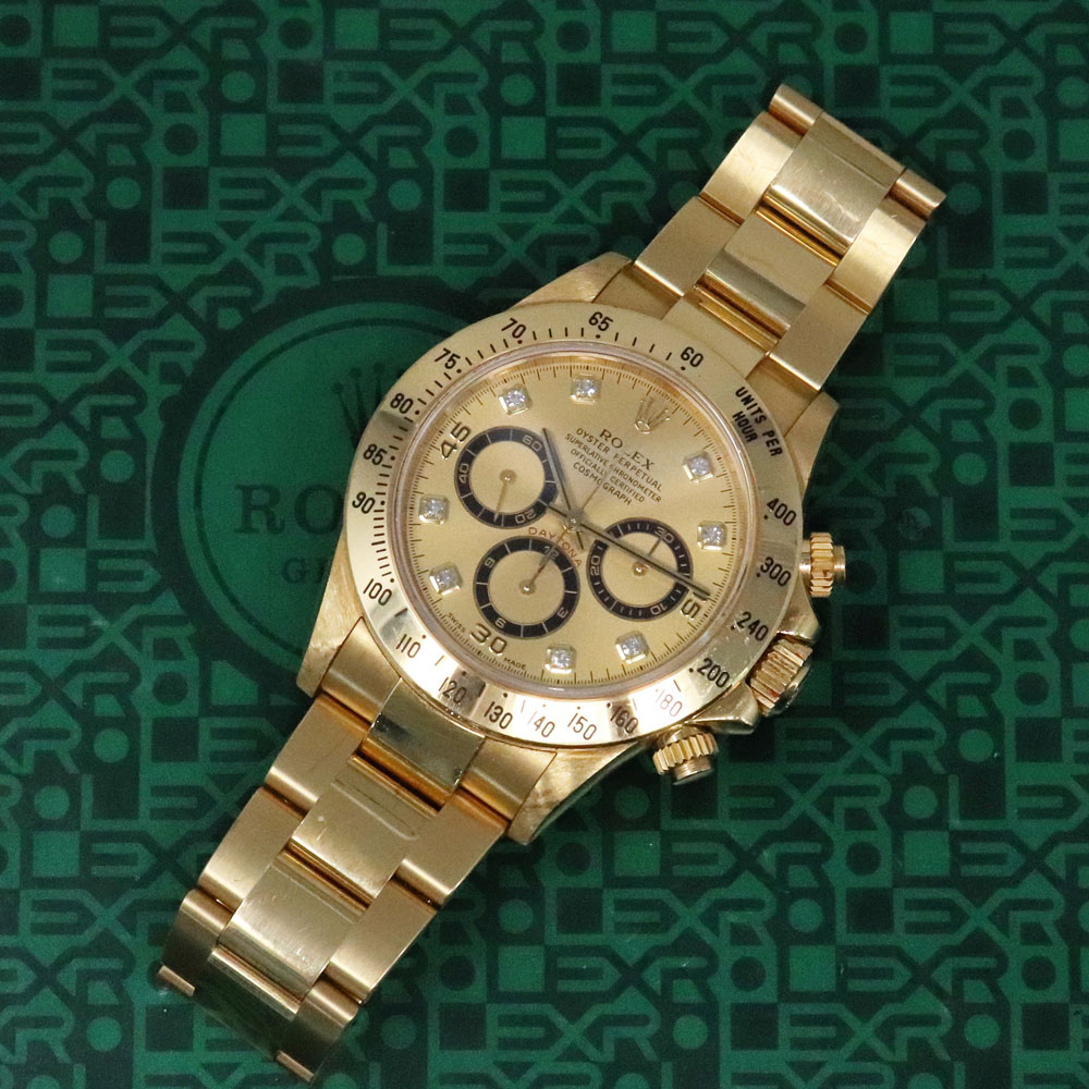 preowned rolex daytona gold boca raton