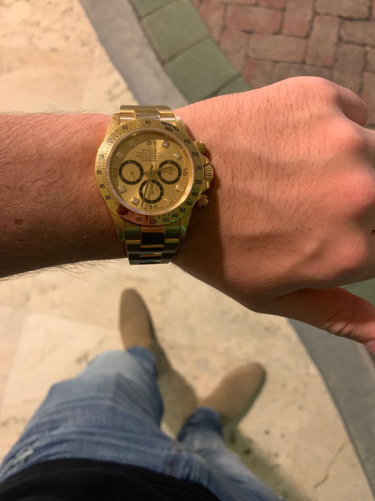 Gold daytona on on sale wrist