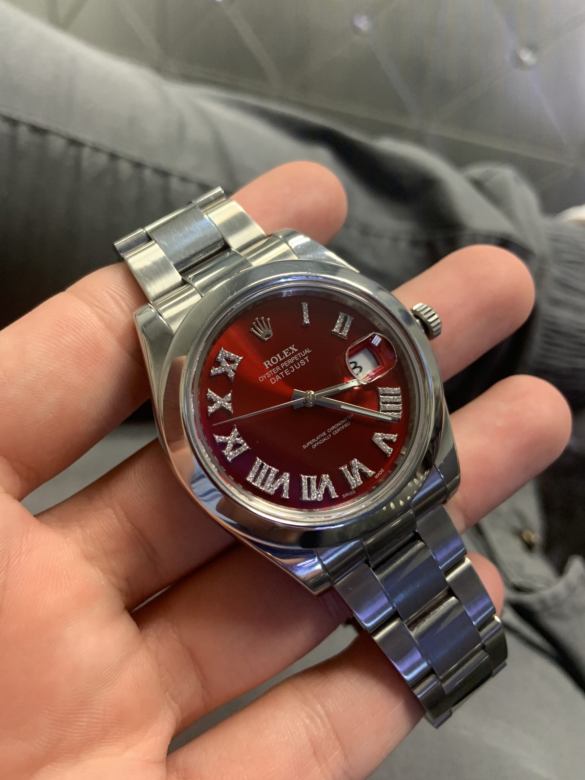 rolex datejust red dial with diamond roman numerals