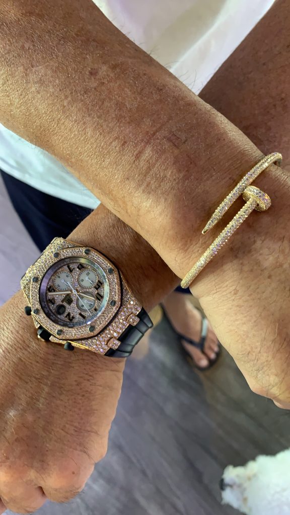 cartier bracelet and AP Royal Oak Offshore stainless steel watch