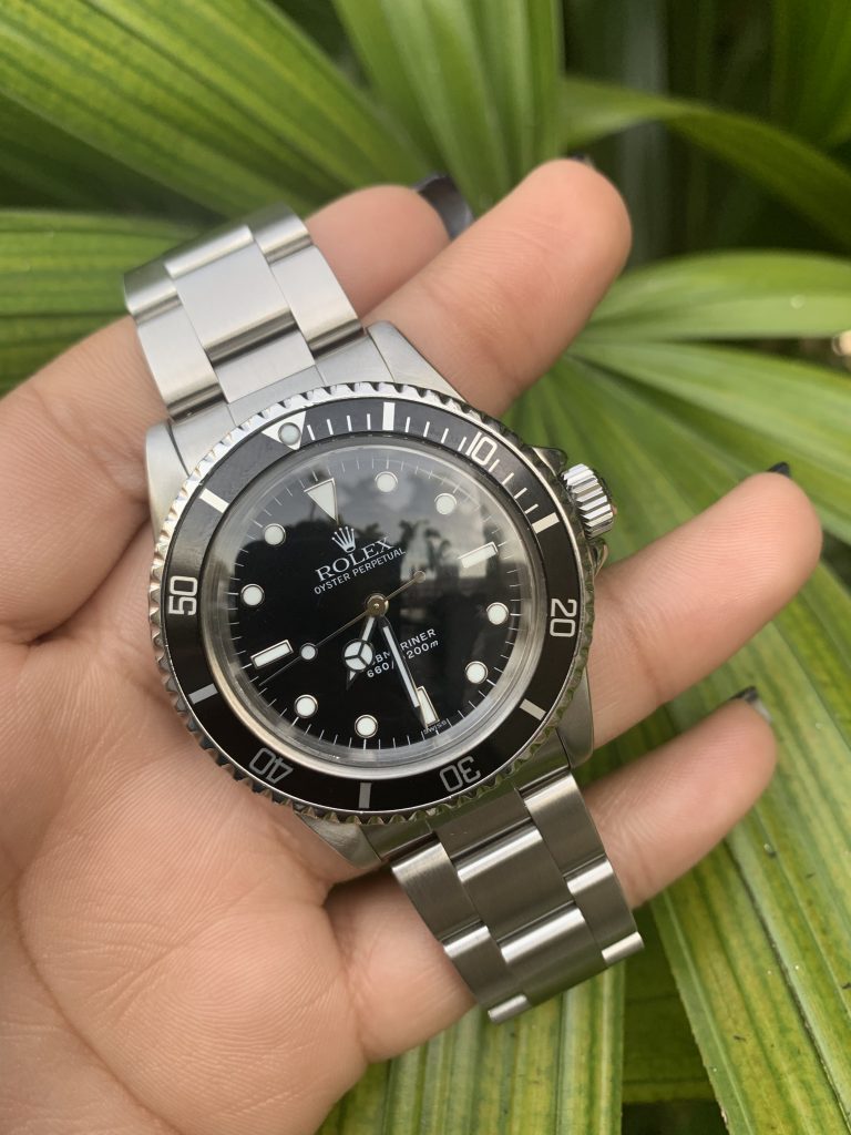 rolex watches for men featuring a rolex submariner with black dial and black bezel in oyster steel