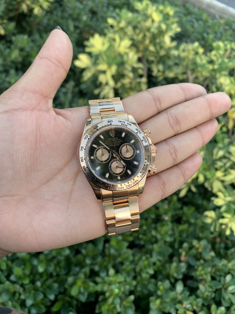 Rolex Cosmograph daytona watch in 18 carat yellow gold and black dial 