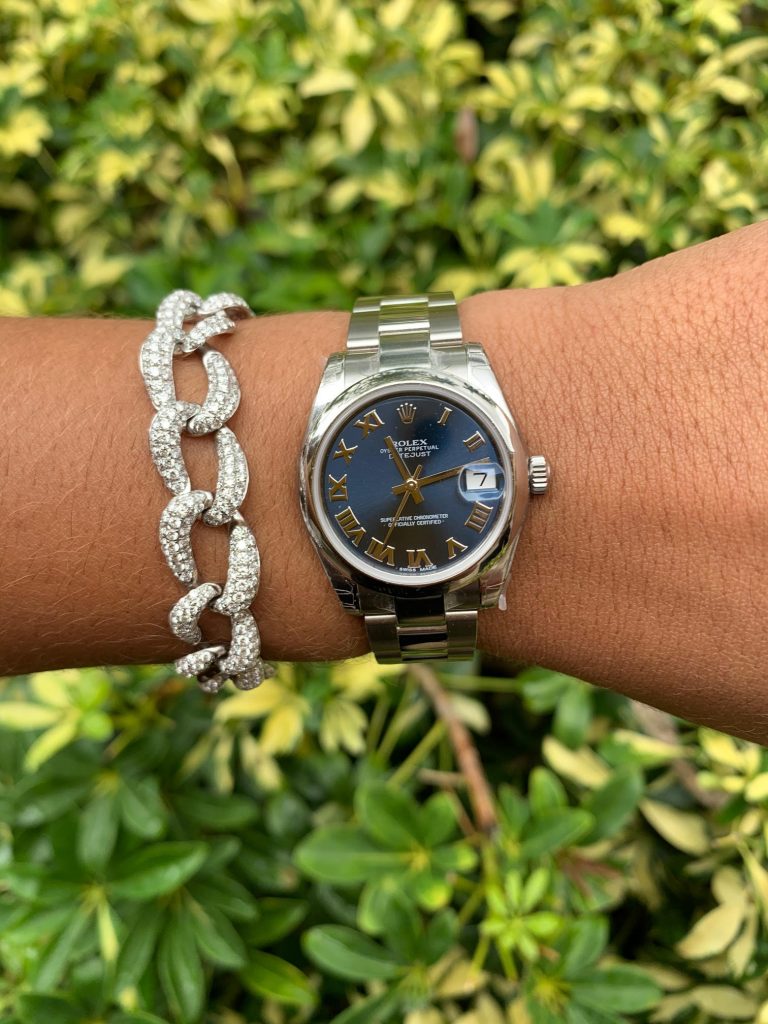 rolex datejust with roman numerals and diamond bracelet