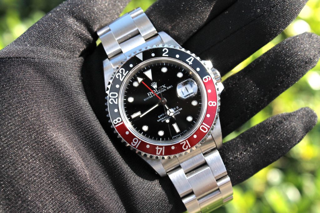 rolex master gmt 2 held up