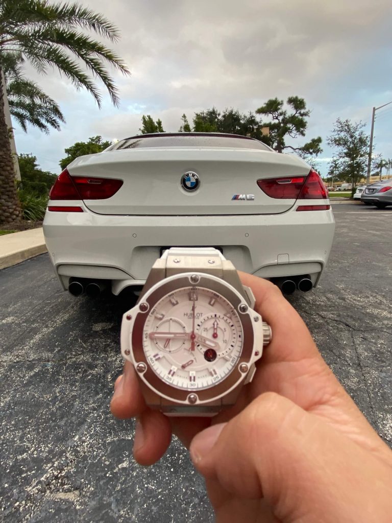 sports watches and luxury cars - hublot and bmw m6 gran coupe