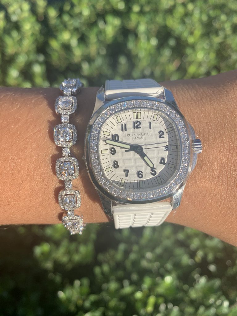 fine jewelry bracelet wron with a patek philippe watch 