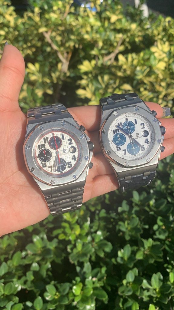 audemars piguet luxury watches offshore panda and navy held up in the sun 