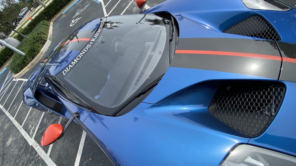 blue cars and sapphire ring