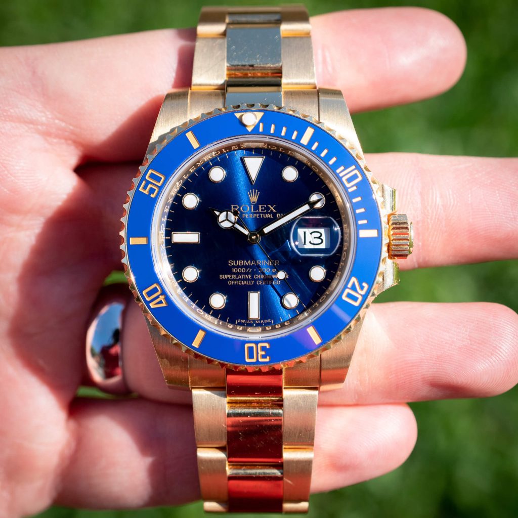 gold rolex submariner blue 