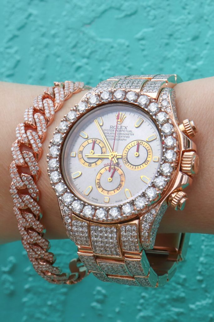 Iced Out Rose Gold Rolex Daytona with Bust Down Cuban Link Bracelet