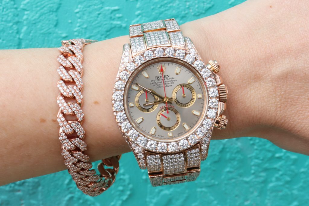 Iced Out Rose Gold Rolex Daytona with Bust Down Cuban Link Bracelet