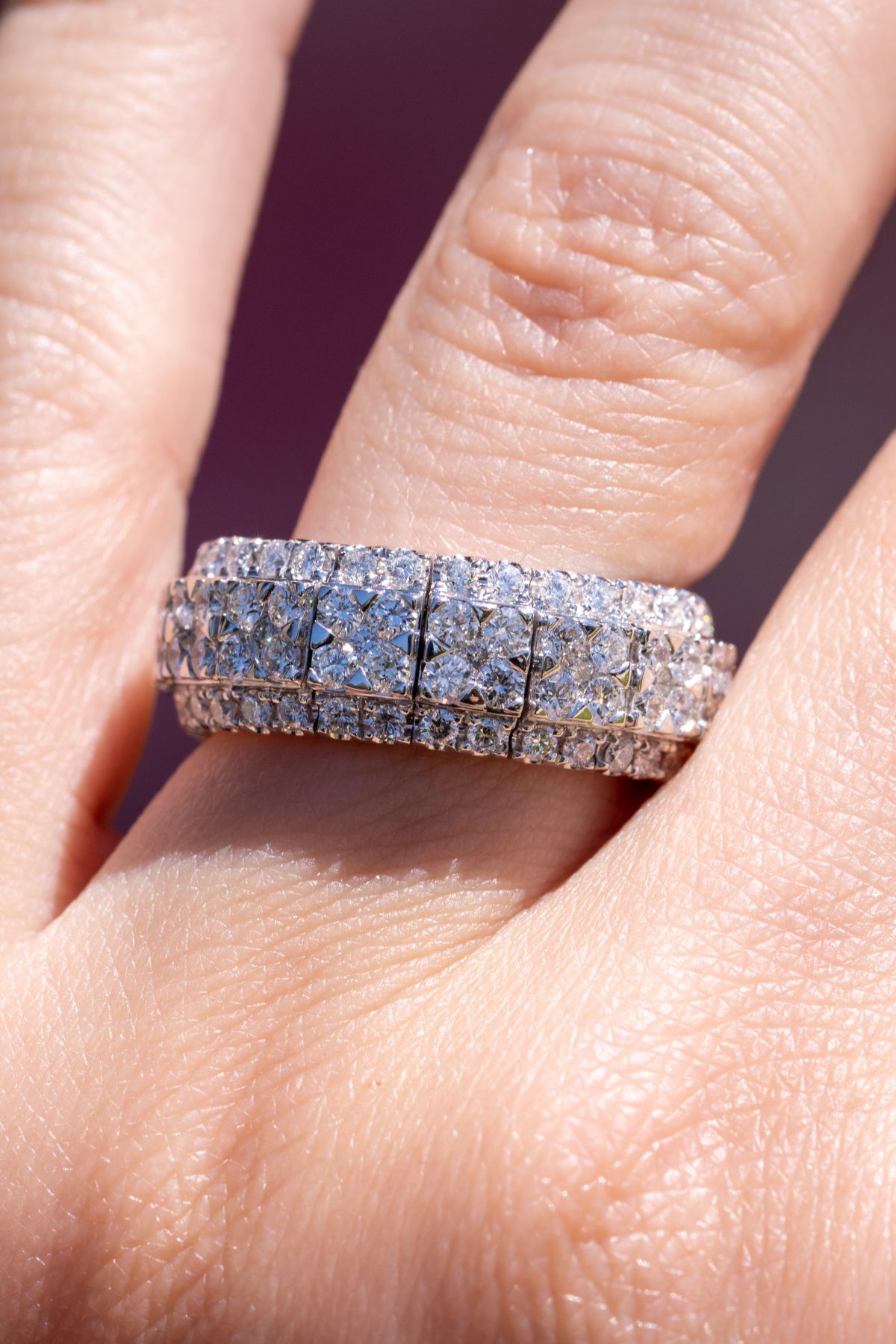 A white gold wedding ring with sparkles