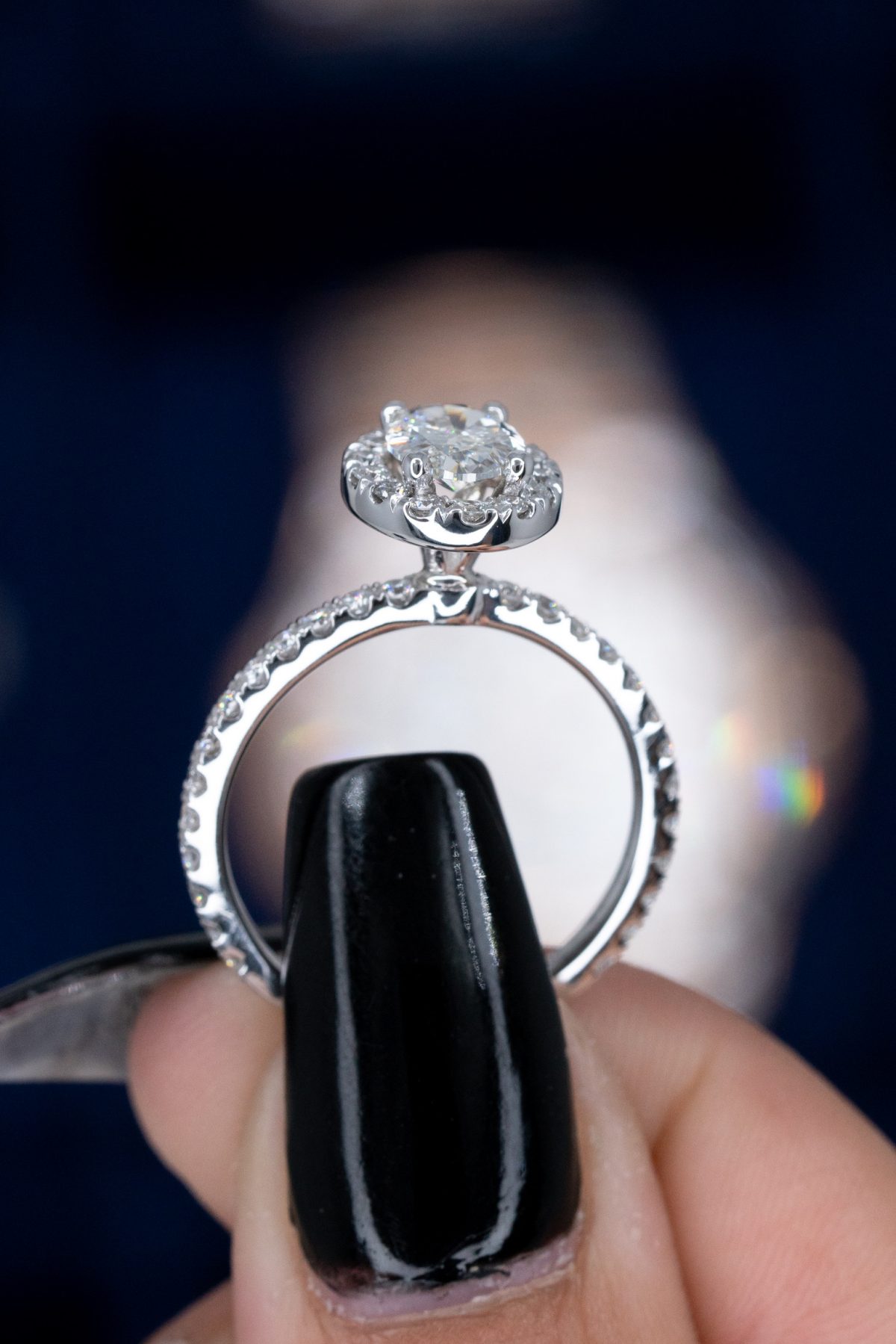 Halo oval engagement rings