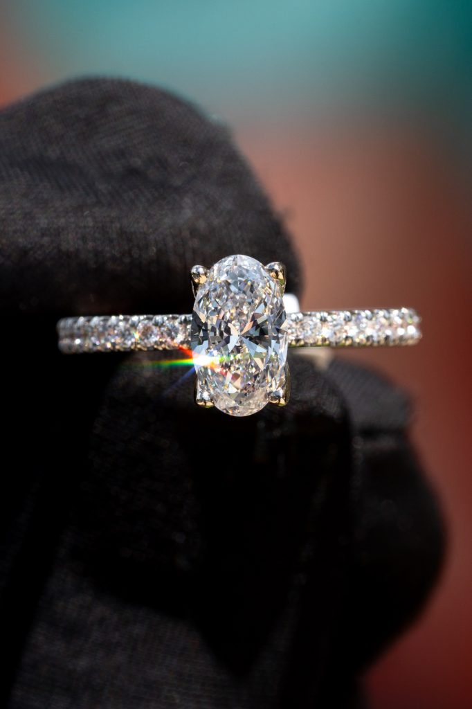 a pave-set oval engagement ring