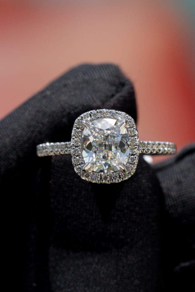 a cushion diamond in an engagement ring