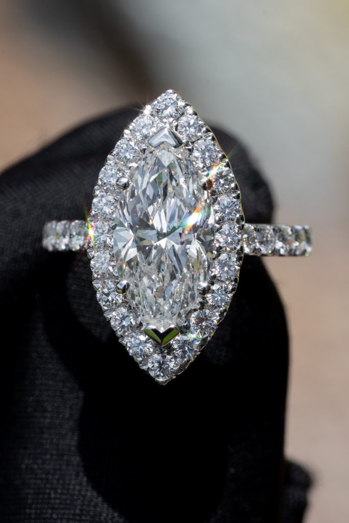 an embellished marquise engagement ring