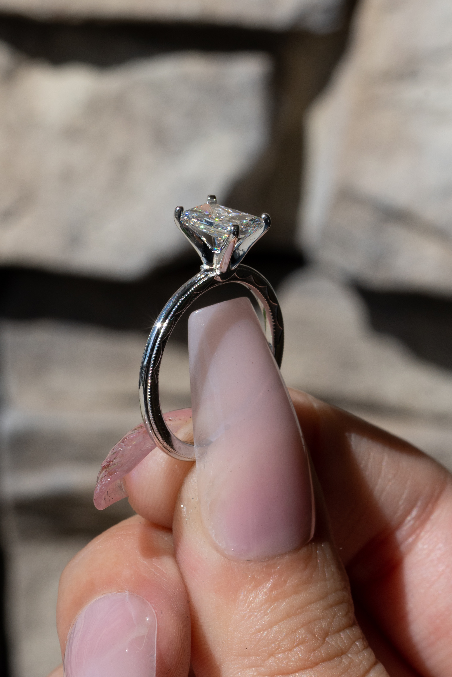 a radiant-cut solitaire ring