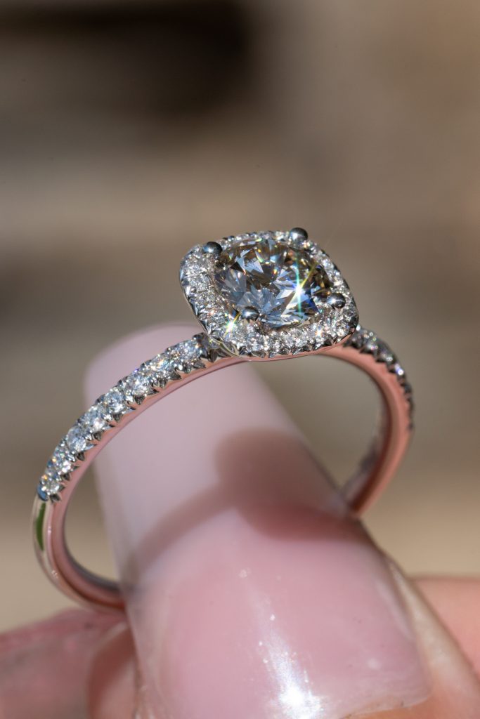 round-cut diamond in an engagement ring
