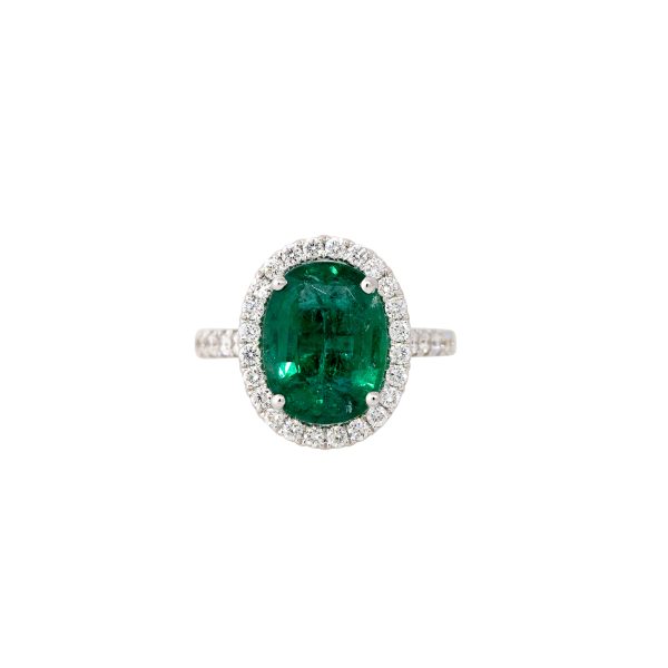 GIA 18k White Gold 4.5ctw Oval Shape Emerald & 0.75ctw Diamond Halo Ring